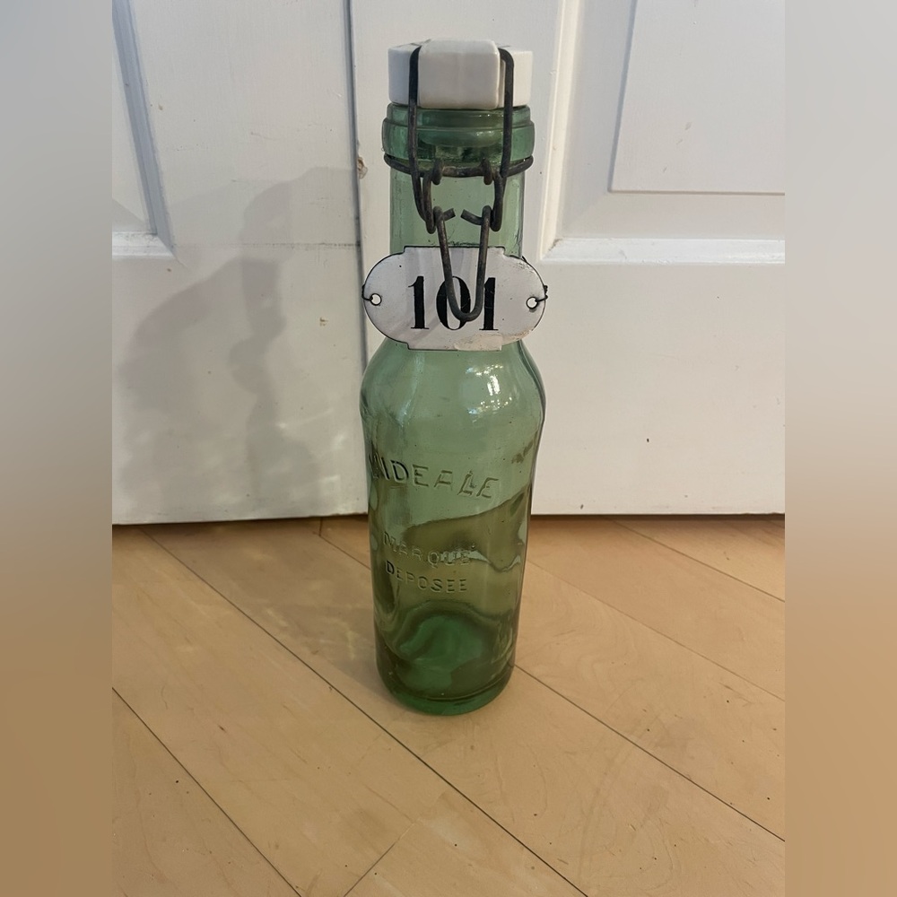 French antique L'ideale bottle with porcelain top